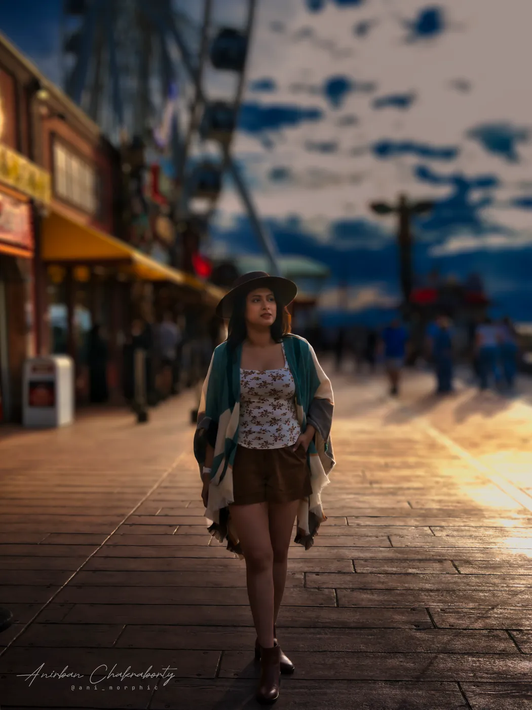 Walking the pier into the last of the sun